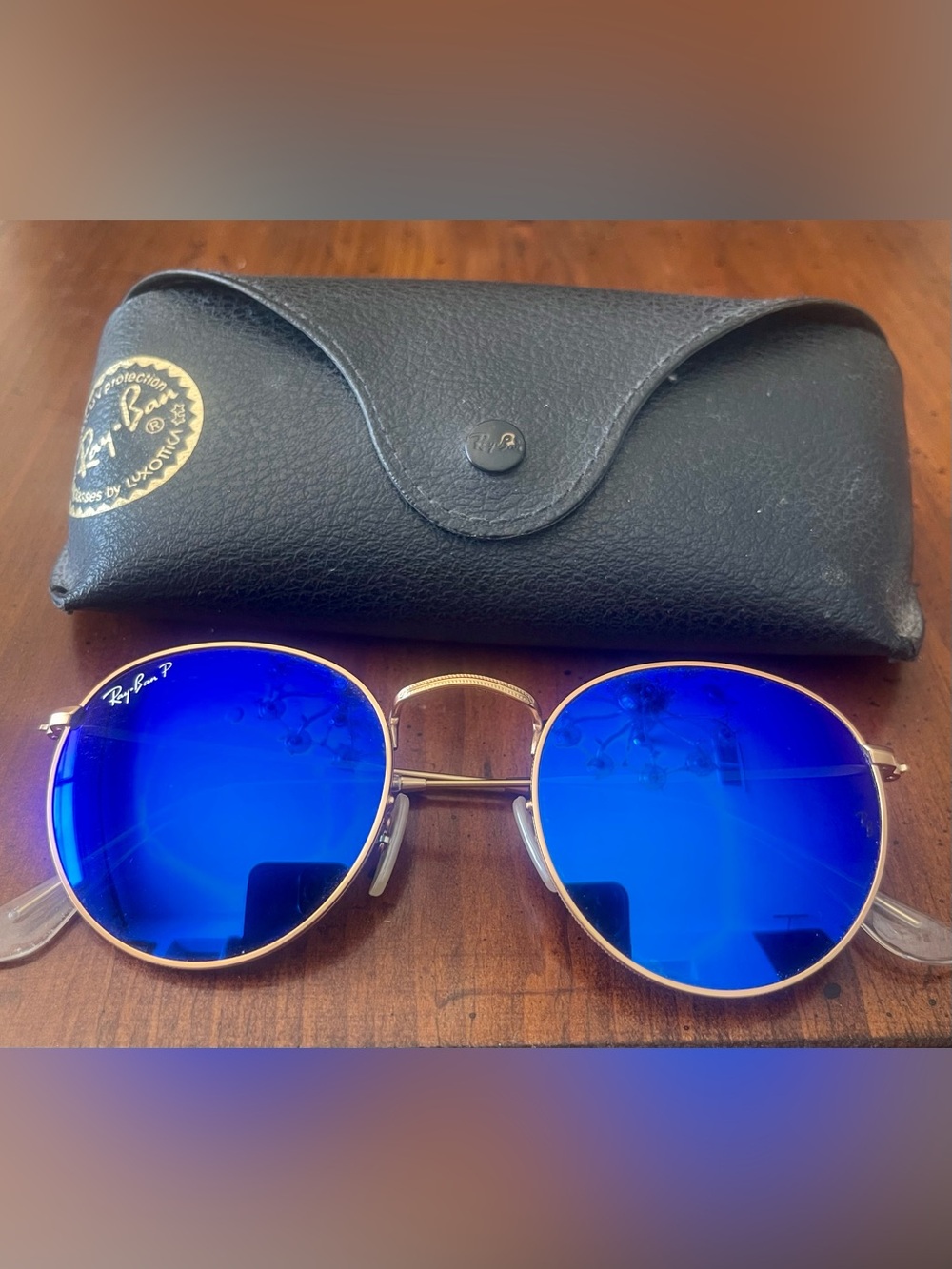 Ray-Ban Round Metal Polarized Sunglasses with Blue Lenses and Gold Frame
